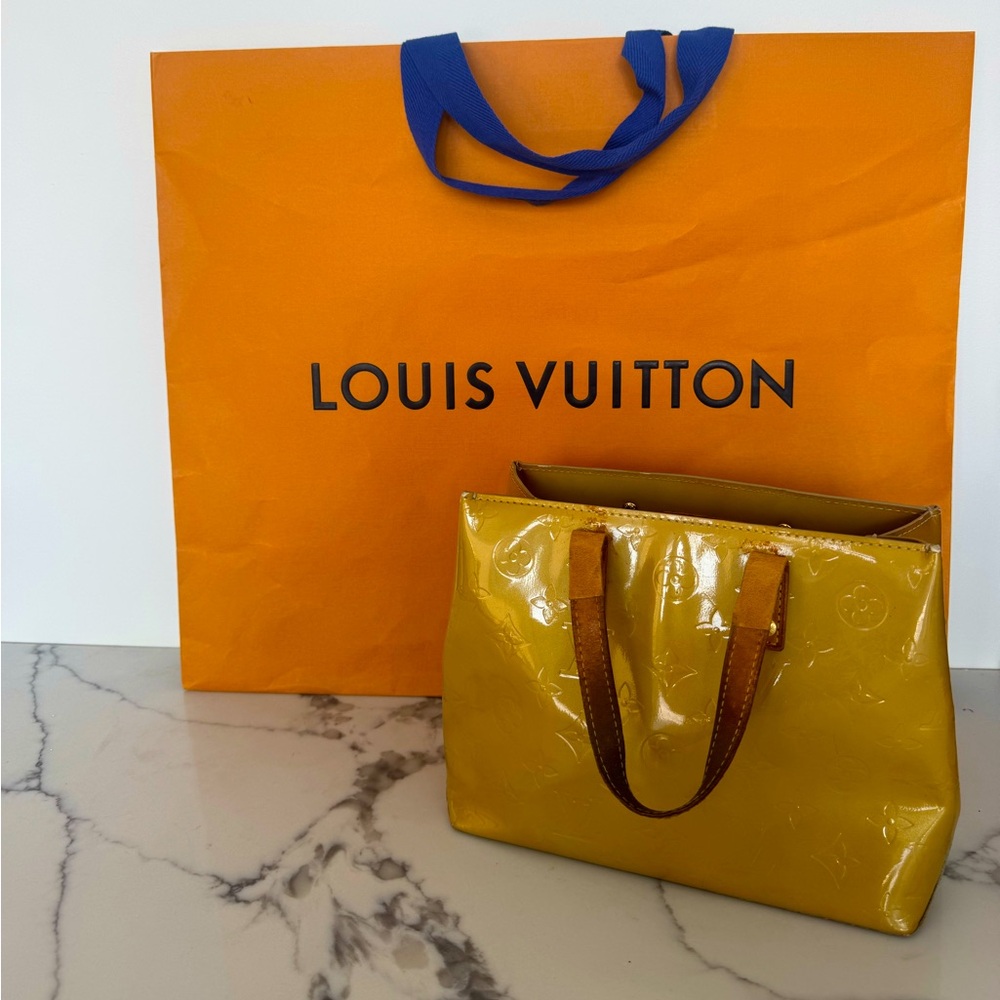 Vintage gold Louis Vuitton handbag